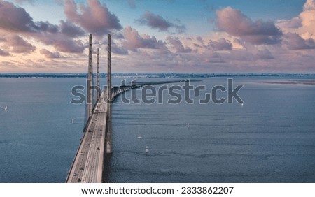 Similar – Image, Stock Photo Bridge over sea on cloudy day