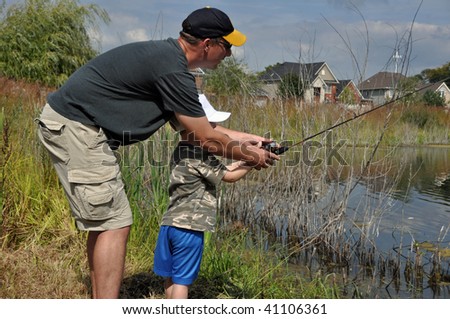 a father teaches his son to fish