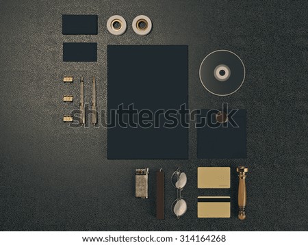 Set of identity elements on black leather background. High resolution