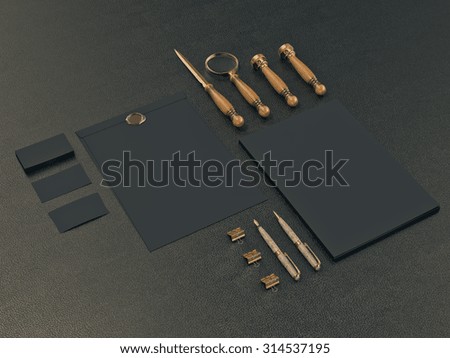 Set of identity elements on black leather background. High resolution