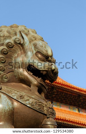 Chinese guardian lions in front of an ancient Chinese palace
