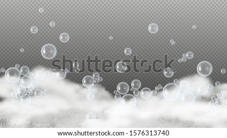 Soap foam. White suds, shiny water bubbles. Shampoo or shower gel lather isolated on transparent background. Realistic foam vector background