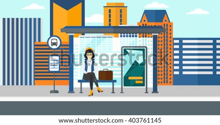 Woman waiting for bus.