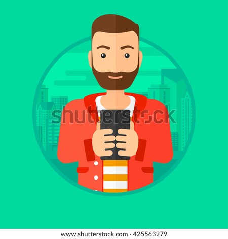 A hipster man with the beard using smartphone on a city background. Vector flat design illustration in the circle isolated on background.