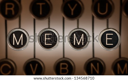 Close up of old typewriter keyboard with scratched chrome keys that spell out \