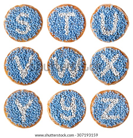 'Beschuit met muisjes', a traditional treat to celebrate the birth of a child in The Netherlands. Blue for a boy. High resolution alphabet S to Z, including the Dutch digraph IJ. Isolated on white. Imagine de stoc © 