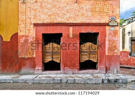 Saloon with swinging doors in Mexico on a colorful cobblestone street
