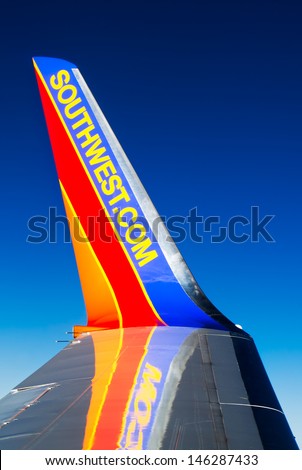 SEATTLE-MAR. 31: The wing of a Southwest Airlines plane in flight on Mar. 31, 2013 from Seattle, WA. The domestic carrier announced it will launch its first international flights in 2014.