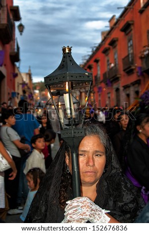 SAN MIGUEL DE ALLENDE, MEXICO - APRIL 6: Unidentified woman in the Holy Week procession on Good Friday in San Miguel de Allende, Mexico on April 6, 2007. The 4-mile pageant attracts thousands.