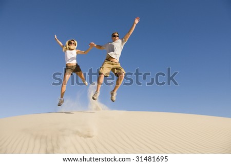 Similar – Jumping in Sand Dunes