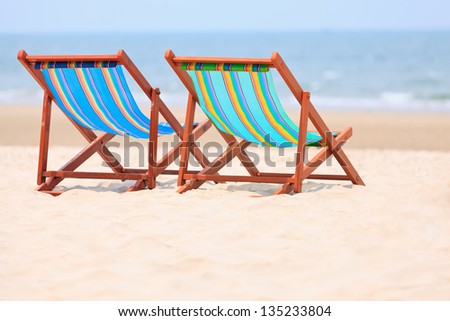 Colorful chairs on tropical beach