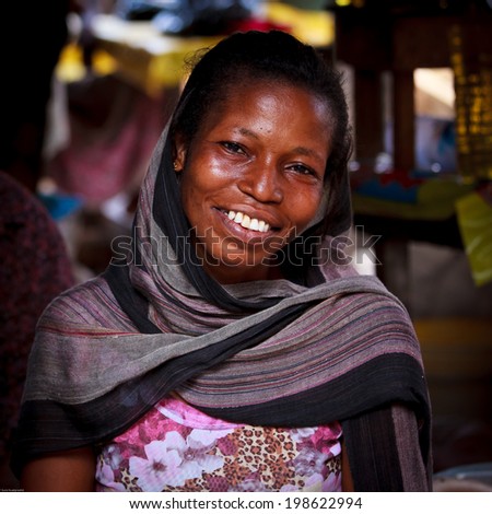 ACCRA, GHANA MARCH 18: Unidentified African woman pose with smiling face on March 18, 2014 in Accra, Ghana. Ghana is one of the most popular tourists destination in Africa.