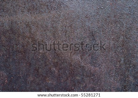 The surface of the old metal, visible rust