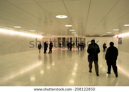 NEW YORK, USA - MARCH 26: Unknown people in Brookfield Place. Brookfield\'s properties include One Liberty Plaza and the World Financial Center in the USA on March 26, 2014 in New York, USA