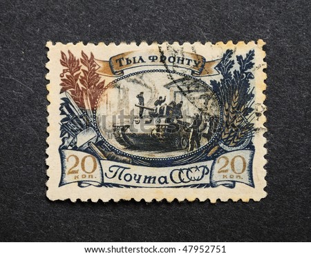 USSR - CIRCA 1945: A Stamp printed in the USSR shows the tank at factory gate, circa 1945