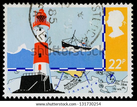 UNITED KINGDOM - CIRCA 1985: A used postage stamp printed in Britain showing a RNLI Lifeboat Launch and Signal Flags for Safety at Sea, circa 1985