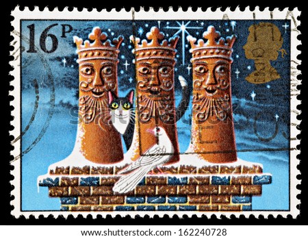 UNITED KINGDOM - CIRCA 1983: A British Used Christmas Postage Stamp showing the Three Kings as Chimney Pots, circa 1983