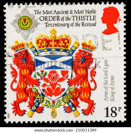 UNITED KINGDOM - CIRCA 1987: A used postage stamp printed in Britain showing the Coat of Arms of the Lord Lyon King of Arms