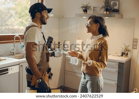 Similar – Image, Stock Photo Professional female master fixing wheel of motorbike