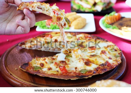 lifted pizza look tasty