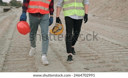 Similar – Image, Stock Photo Road construction worker with orange pants and shovel