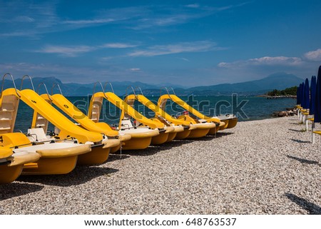 Similar – Image, Stock Photo colourful pedal boats lying on the beach of Mallorca