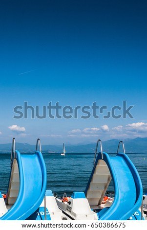 Similar – Image, Stock Photo colourful pedal boats lying on the beach of Mallorca