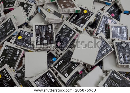 FALLS CHURCH, VA - JULY 18: A load of used non refillable OEM brand name ink cartridges going for plastic recycling lying on a heap on July 18, 2014 in Falls Church, VA.