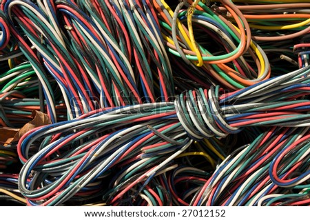 Close-up of electric cables. There is a mix of plastic and copper to recover.