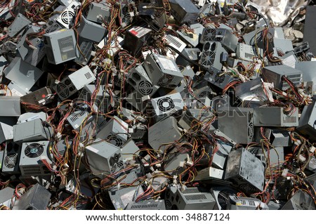 A pile of computer power supply boxes for recycling