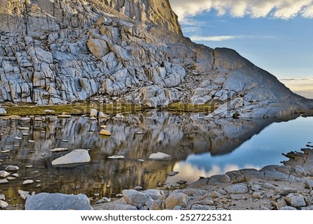 Similar – Image, Stock Photo Clear pond near rocks at sunset