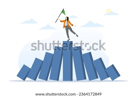 winner takes all concept, survival in business competition or strength to overcome difficulties, economic crisis, business winner, successful businessman standing strong domino collapse bar graph.