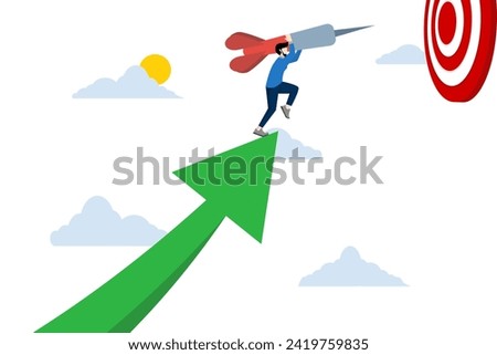 Successful business target achievement concept, achieving target and goal concept, holding graphic arrow up and jumping on target to win in business strategy, businessman leader.