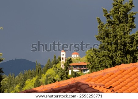 Similar – Image, Stock Photo Thunderstorm over the hill . Only a small bright glow over the blue black rain clouds, the rainforest.  As if the world wanted to end.