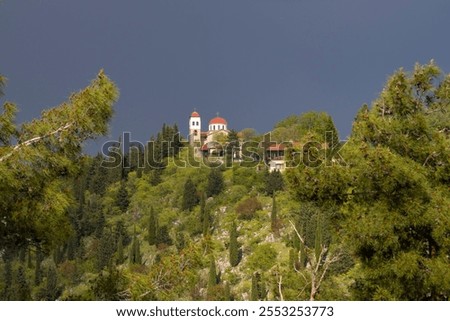 Similar – Image, Stock Photo Thunderstorm over the hill . Only a small bright glow over the blue black rain clouds, the rainforest.  As if the world wanted to end.