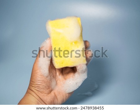 Similar – Image, Stock Photo Hand holds a yellow arrow with the word luck on it against a neutral turquoise background. Way to happiness.