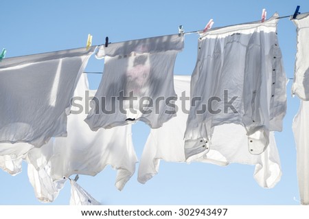 White laundry drying on a washing line