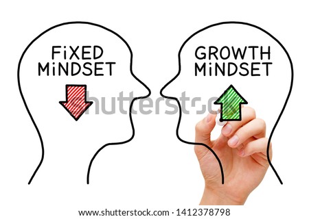 Hand drawing Fixed Mindset vs Growth Mindset success concept with black marker on transparent wipe board.