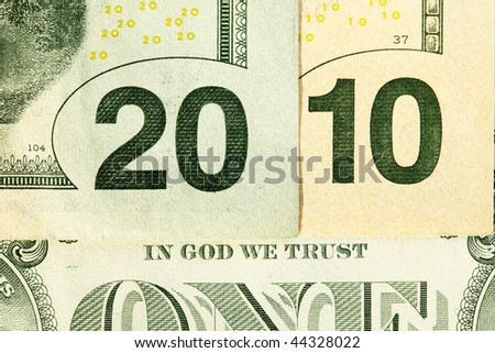 Twenty and ten dollars bills making year 2010 concept with \