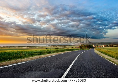Sunset landscape with coastal road
