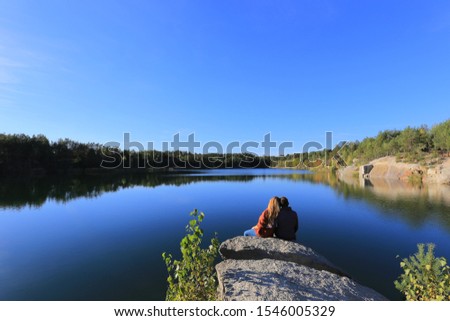 Similar – Image, Stock Photo Traveling couple near lake in forest