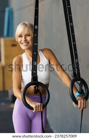 Similar – Image, Stock Photo Fit woman looking out window