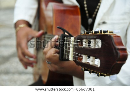 Man playing the Spanish guitar