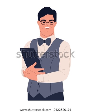 Down Syndrome waiter working in restaurant. Social inclusion concept. Confident man waitress wearing uniform and bow tie standing with digital tablet