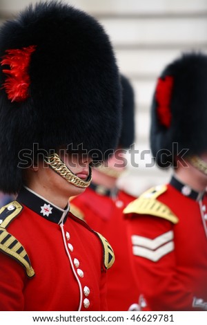 LONDON - JULY 28: Her Majesty\'s Coldstream Regiment of Foot Guards, also known officially as the Coldstream Guards, performing the Changing of the Guards on July 28, 2009 in London, England.