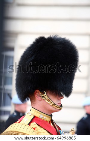 LONDON - JULY 28: Her Majesty's Coldstream Regiment of Foot Guards, also known officially as the Coldstream Guards, performs the Changing of the Guards on July 28, 2009 in London, England.