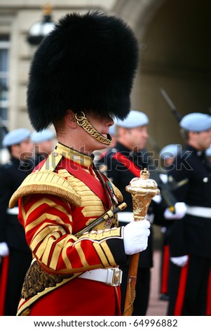 LONDON - JULY 28: Her Majesty\'s Coldstream Regiment of Foot Guards, also known officially as the Coldstream Guards, performs the Changing of the Guards on July 28, 2009 in London, England.