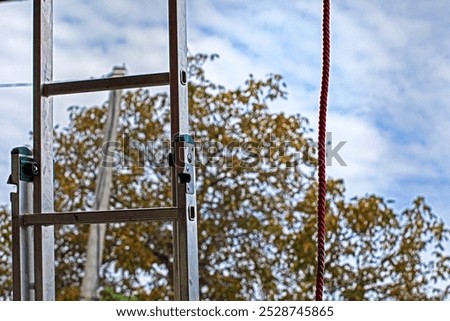 Similar – Foto Bild Strickleiter gegen blauen Himmel und Wolken