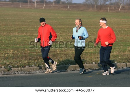 Three running in the cold winter weather
