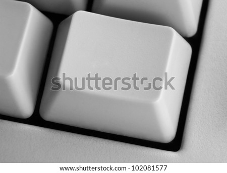 Closeup of empty computer key on keyboard with space for your text or image